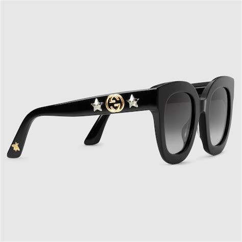 Gucci Lentes de sol de acetato con marco redondo con estrella